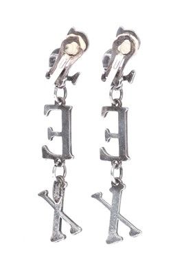 Lot 451 - A pair of Vivienne Westwood clip-on 'SEX' earrings, 'Always on Camera' collection, autumn-winter 1992-93