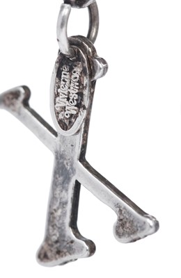 Lot 451 - A pair of Vivienne Westwood clip-on 'SEX' earrings, 'Always on Camera' collection, autumn-winter 1992-93