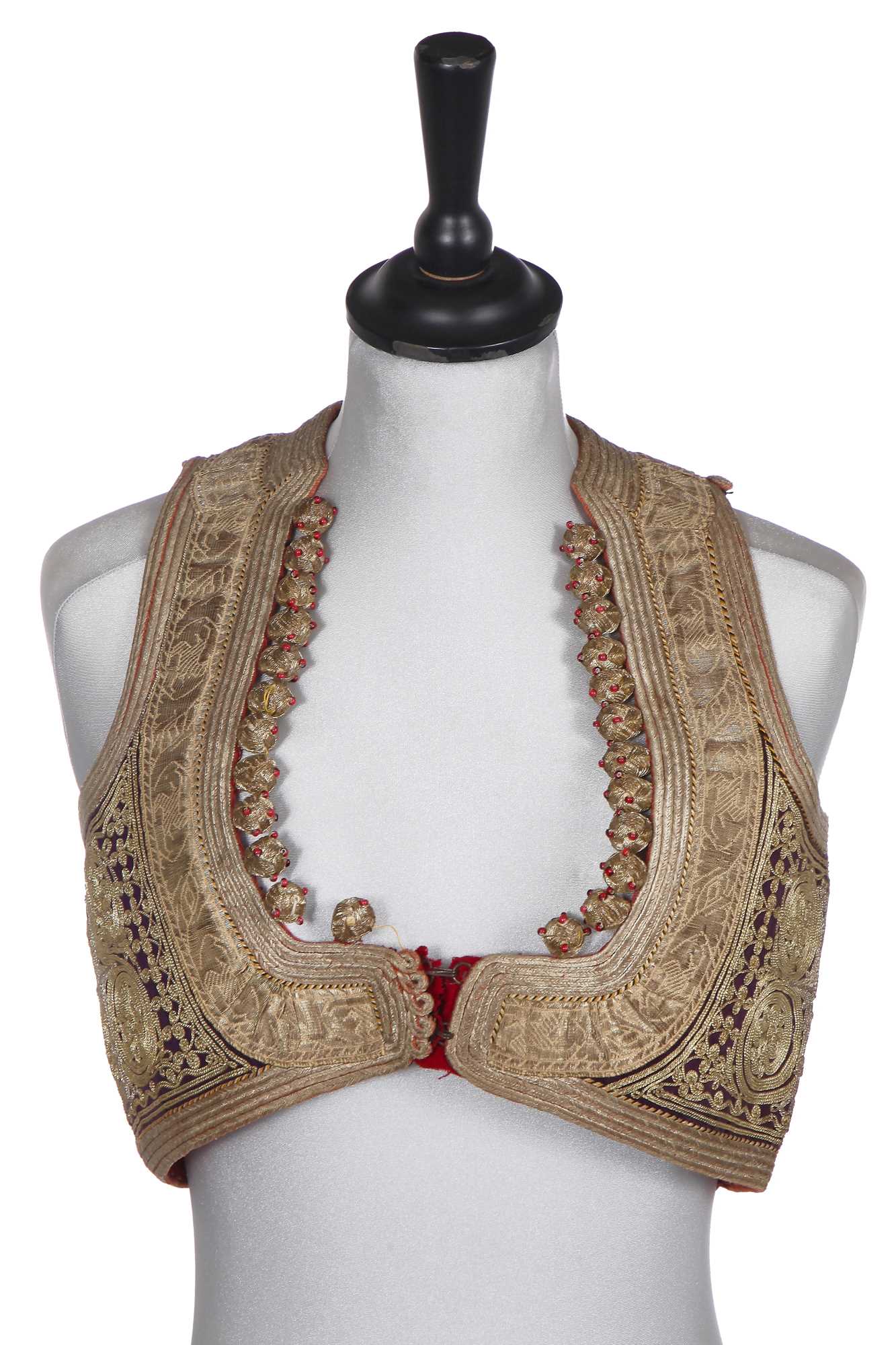 Lot 499 - An embroidered purple velvet waistcoat, probably Serbian Ottoman empire, mid-19th century