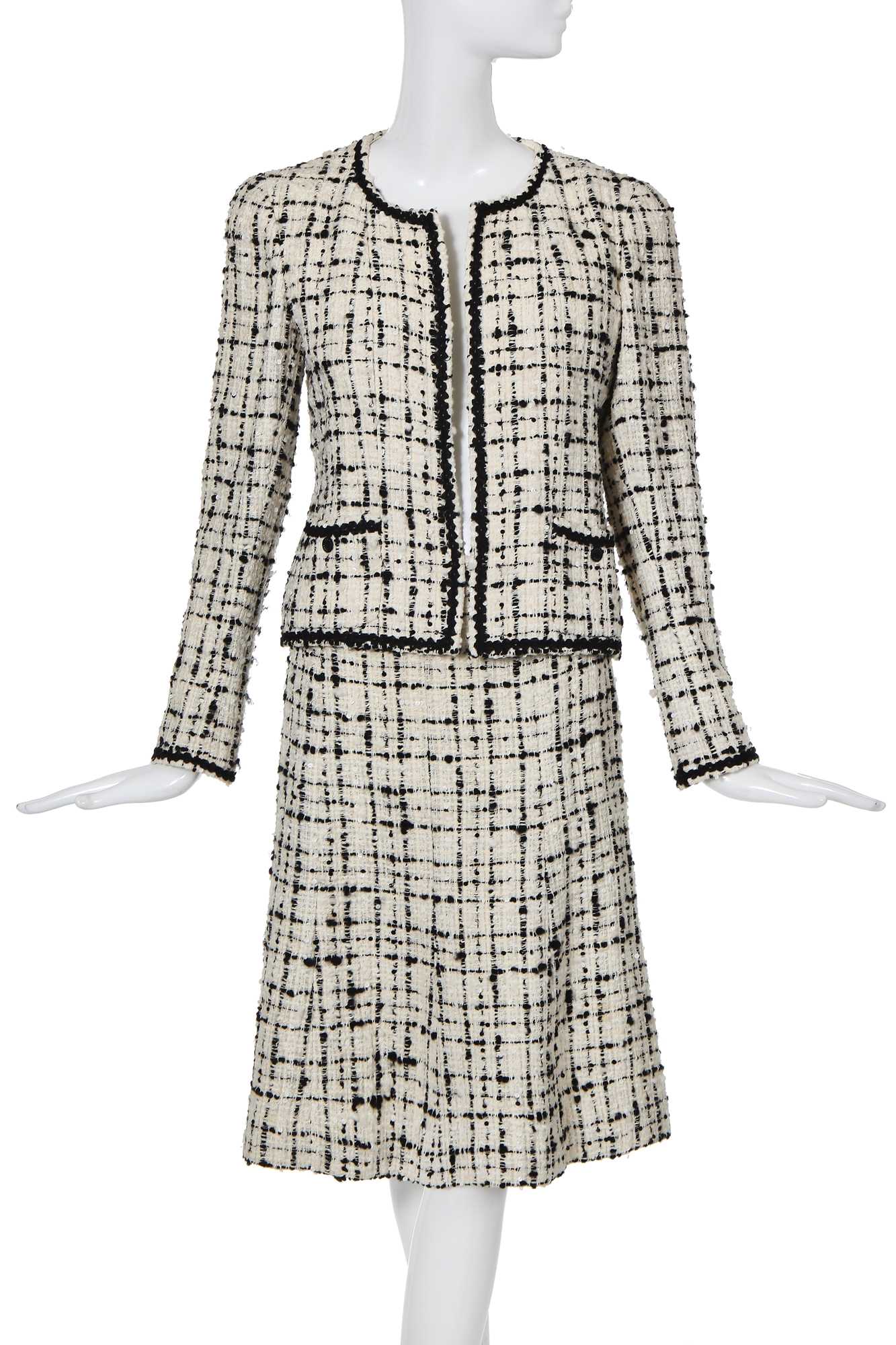 Lot 4 - A Chanel black and white bouclé tweed suit, Cruise collection 2003