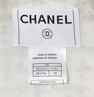 Lot 4 - A Chanel black and white bouclé tweed suit, Cruise collection 2003