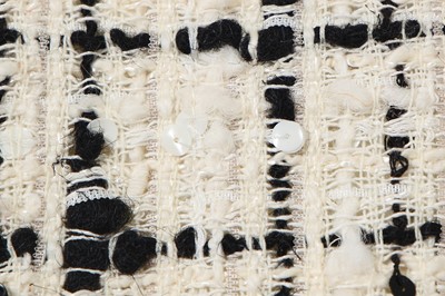 Lot 4 - A Chanel black and white bouclé tweed suit, Cruise collection 2003