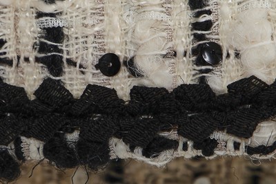 Lot 4 - A Chanel black and white bouclé tweed suit, Cruise collection 2003