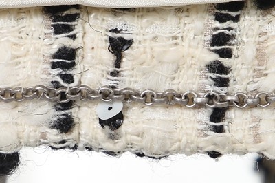 Lot 4 - A Chanel black and white bouclé tweed suit, Cruise collection 2003