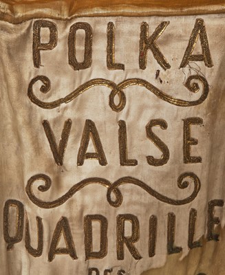 Lot 95 - An Erté sequined gold lamé coat, 1930s