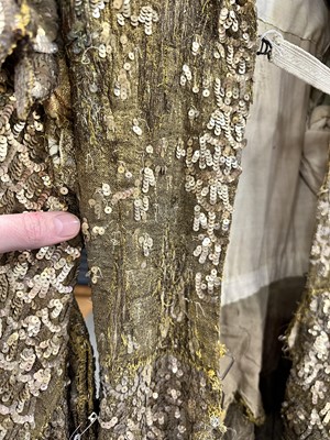 Lot 95 - An Erté sequined gold lamé coat, 1930s