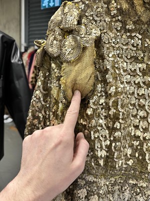 Lot 95 - An Erté sequined gold lamé coat, 1930s