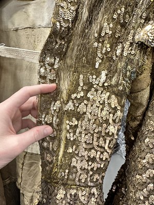 Lot 95 - An Erté sequined gold lamé coat, 1930s