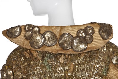 Lot 95 - An Erté sequined gold lamé coat, 1930s