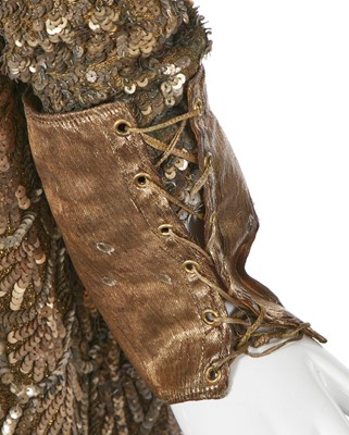 Lot 95 - An Erté sequined gold lamé coat, 1930s