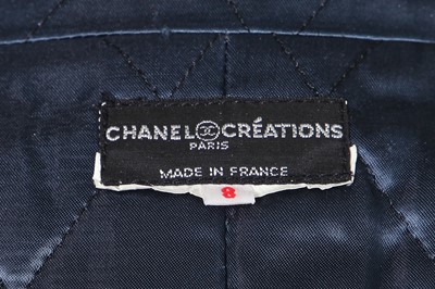 Lot 13 - A Chanel navy velvet cocktail suit, late 1970s-early 80s