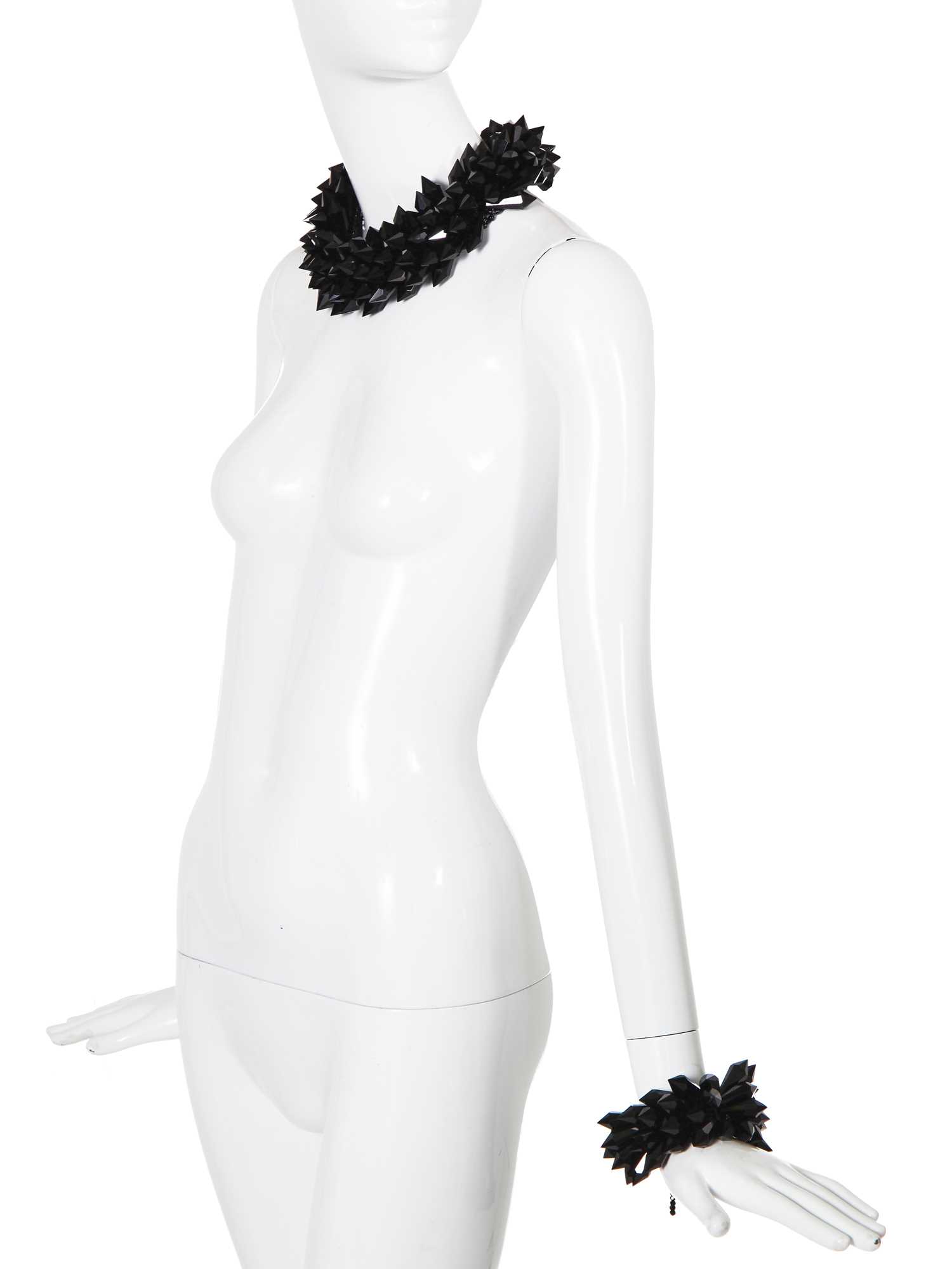 Lot 48 - A choker necklace and matching bracelet of black cut-glass, probably Butler & Wilson, modern