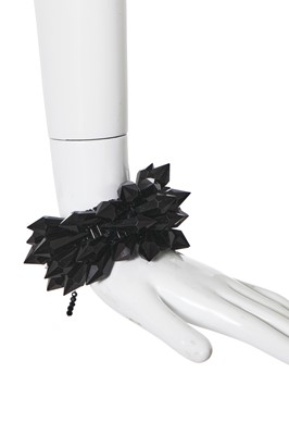 Lot 48 - A choker necklace and matching bracelet of black cut-glass, probably Butler & Wilson, modern