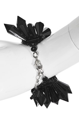 Lot 48 - A choker necklace and matching bracelet of black cut-glass, probably Butler & Wilson, modern