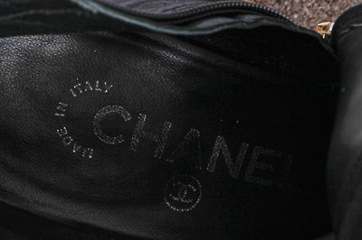 Lot 28 - A pair of Chanel black leather boots, 2010s