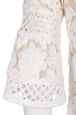 Lot 236 - A Pierre Balmain white soutache lace dress,...
