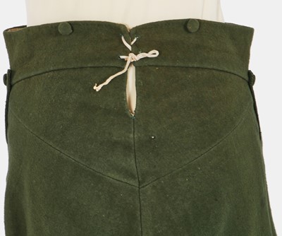 Lot 5 - A green wool coachman's livery ensemble, Italian, early 19th century