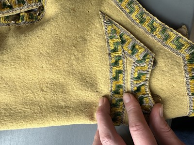 Lot 5 - A green wool coachman's livery ensemble, Italian, early 19th century