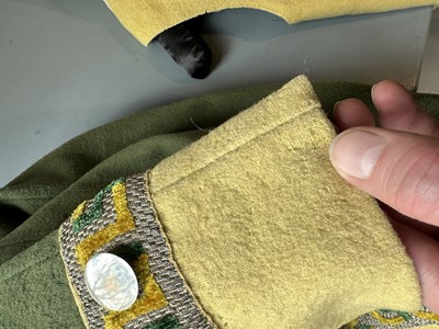 Lot 5 - A green wool coachman's livery ensemble, Italian, early 19th century