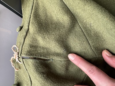 Lot 5 - A green wool coachman's livery ensemble, Italian, early 19th century
