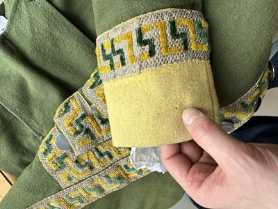 Lot 5 - A green wool coachman's livery ensemble, Italian, early 19th century