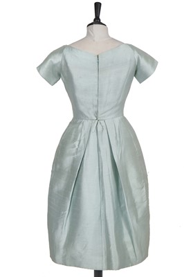 Lot 367 - A Christian Dior London ice-blue slubbed silk cocktail dress, 1959