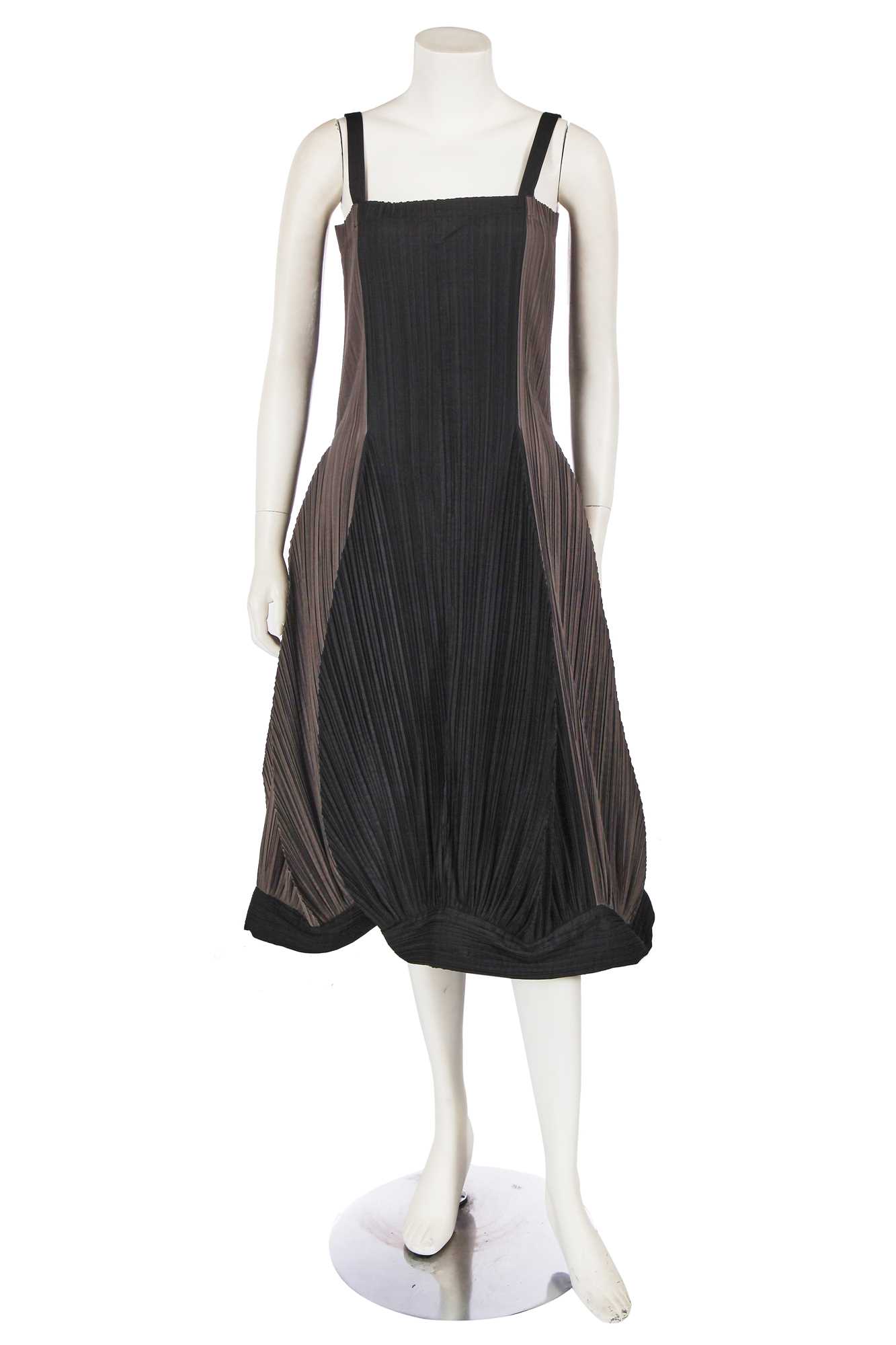 Lot 290 - An Issey Miyake grey and black pleated polyester dress, Autumn-Winter 1990-91