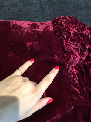 Lot 452 - An Elizabeth Handley Seymour burgundy velvet opera coat, circa 1935
