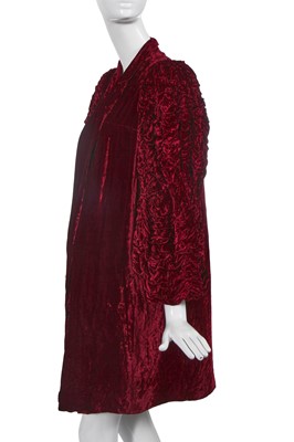 Lot 452 - An Elizabeth Handley Seymour burgundy velvet opera coat, circa 1935