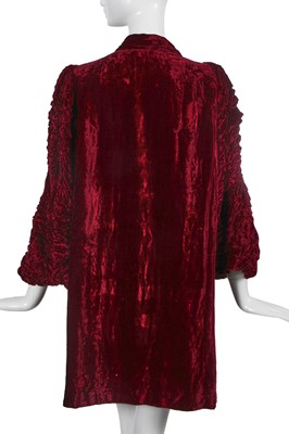 Lot 452 - An Elizabeth Handley Seymour burgundy velvet opera coat, circa 1935