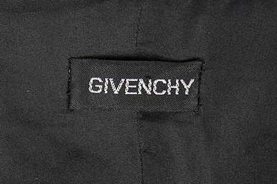 Lot 22 - A Givenchy couture black wool and satin faced...