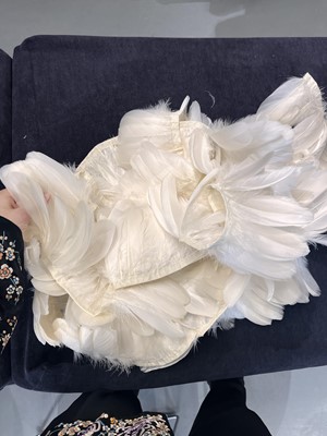 Lot 636 - An unfinished André Courrèges haute couture black velvet and feather evening gown, 1960s