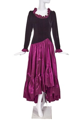 Lot 395 - An Yves Saint Laurent black velvet and purple taffeta evening gown, circa 1980
