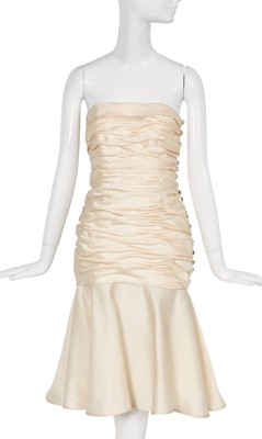 Lot 386 - A Balmain haute couture by Erik Mortensen ivory silk cocktail dress, circa 1986