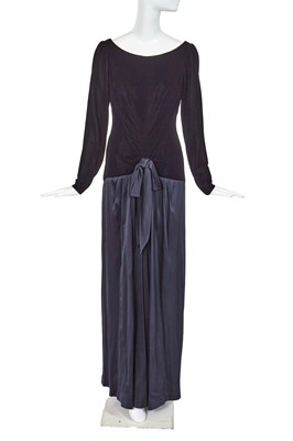 Lot 394 - An Yves Saint Laurent haute couture black velvet and satin evening dress, circa 1982
