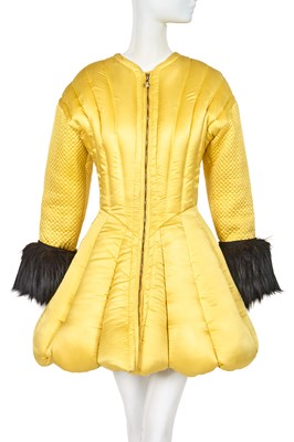 Lot 280 - A Gianni Versace yellow quilted silk puffer coat/dress, 'Miss S&M' collection, Autumn-Winter 1992-93