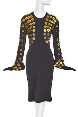 Lot 380 - A Patrick Kelly black wool 'button' dress and gloves, circa 1988