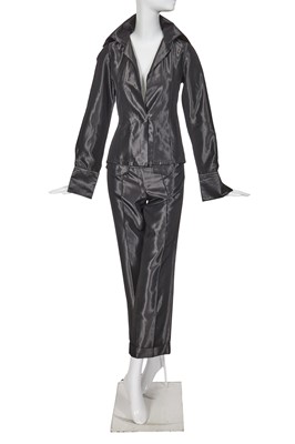 Lot 304 - An Alexander McQueen black ciré satin suit, 'The Hunger' collection, Spring-Summer 1996
