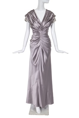 Lot 173 - A Christian Dior by John Galliano dove grey silk satin evening gown, commercial collection 2008
