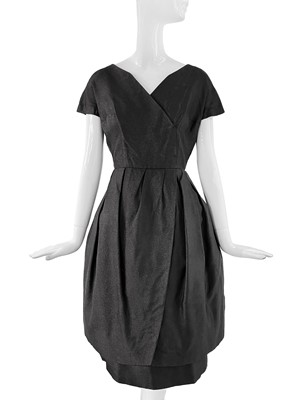 Lot 454 - A Christian Dior black wool and silk 'Comedie' cocktail dress, Autumn-Winter 1956-57