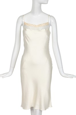 Lot 237 - A Christian Dior by John Galliano white silk cloqué dress, pre-collection 2000