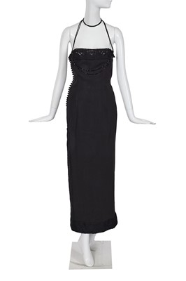 Lot 316 - A Christian Dior by John Galliano black crêpe and lace evening gown, circa 1997