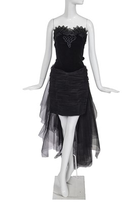 Lot 391 - A Christian Lacroix black velvet and tulle cocktail dress, circa 1989