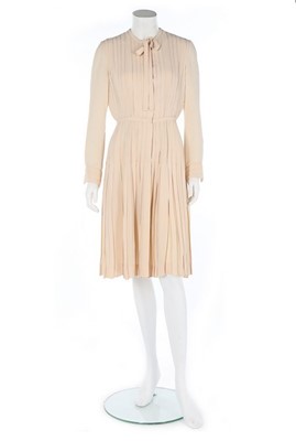 Lot 255 - A Chanel haute couture ivory silk crêpe dress,...