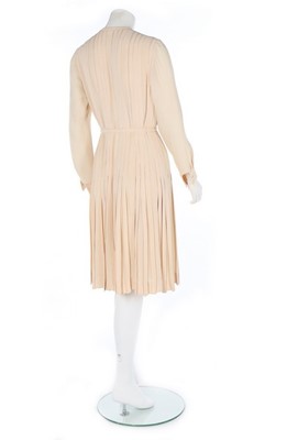 Lot 255 - A Chanel haute couture ivory silk crêpe dress,...