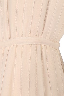 Lot 255 - A Chanel haute couture ivory silk crêpe dress,...