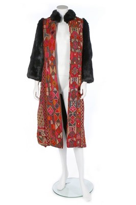 Lot 258 - A Thea Porter Iraqi Samawa-carpet coat, 1970,...