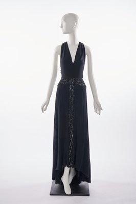 Lot 17 - A Valentino Garavani black silk crêpe halterneck evening dress, circa 2001