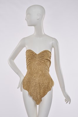 Lot 66 - A Norma Kamali leopard print ultra-suede 'cave-girl' dress, 1980s