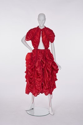 Lot 67 - A Norma Kamali red nylon parachute ensemble, circa 1977